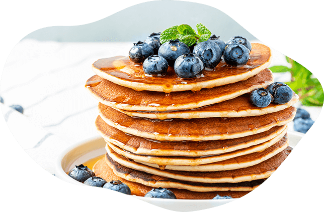 Pancakes z serkiem Danio i borówkami